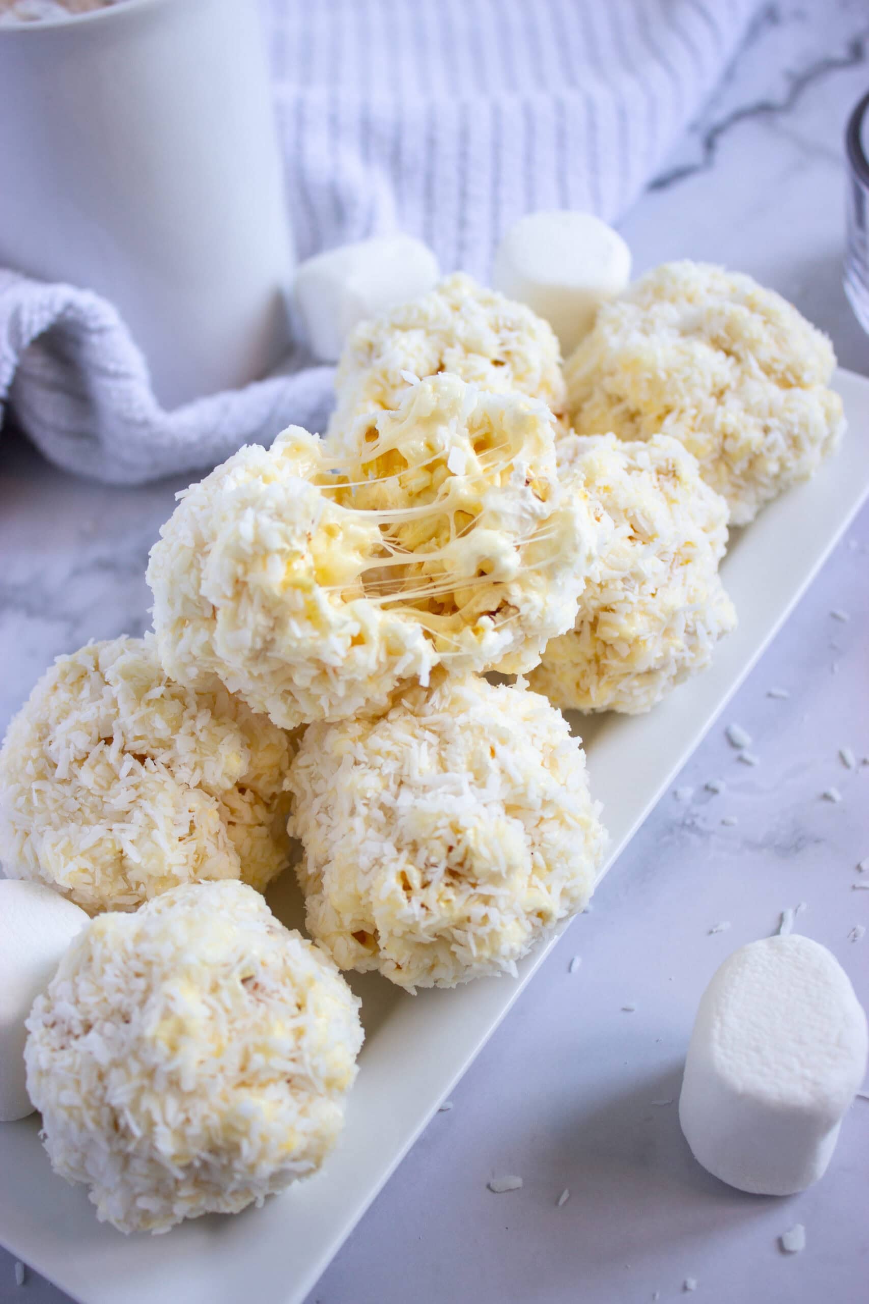 Gooey Coconut Popcorn Marshmallow Snowball Bites